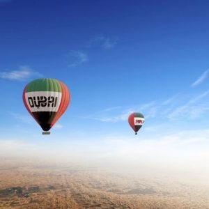 Hot air balloon ride in the blue sky